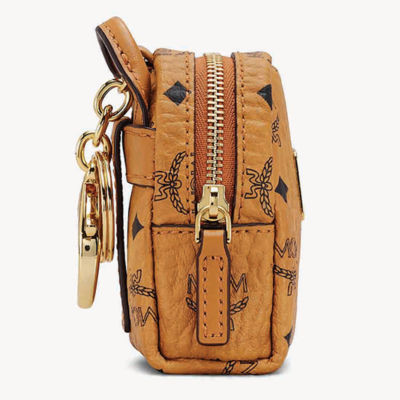 MCM (cognac Backpack Charm with Crossbody Strap in Visetos) – Vip